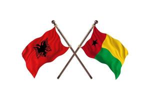 albânia versus guiné-bissau duas bandeiras de país foto