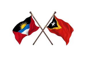 antígua e barbuda contra timor-leste duas bandeiras de país foto