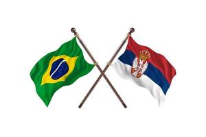 Brasil contra sérvia duas bandeiras de país foto