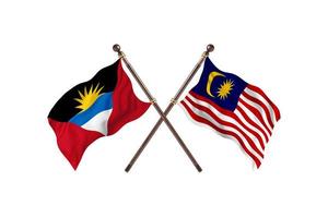 antígua e barbuda versus malásia duas bandeiras de país foto