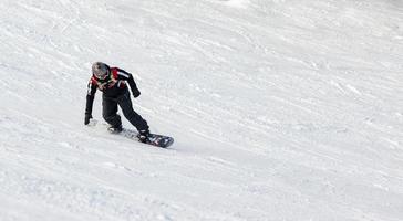 snowboard na colina foto