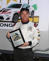 los angeles, 11 de abril - brett davern, vencedor da pole com tempo de qualificação mais rápido para as celebridades no dia de qualificação pro celeb race 2014 em long beach grand prix em 11 de abril de 2014 em long beach, ca foto