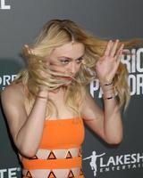 los angeles, 13 de outubro - dakota fanning na exibição especial pastoral americana no teatro samuel goldwyn em 13 de outubro de 2016 em beverly hills, ca foto