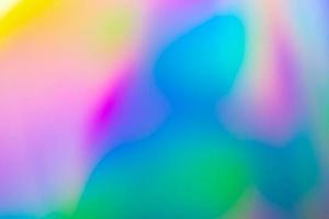 desfoque abstrato fundo iridescente de folha de arco-íris holográfica foto