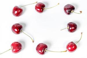 alimentos orgânicos, dieta vegana e conceito de saúde - cerejas doces frescas, sobremesa de frutas suculentas de cereja como fundo de dieta saudável foto