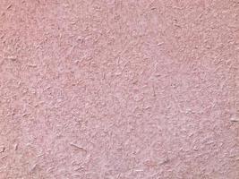 textura, fundo metálico com coloração. a folha de metal é pintada de rosa. textura heterogênea e volumosa com salpicos de tinta. sujeira, detritos e poeira são visíveis através da pintura foto