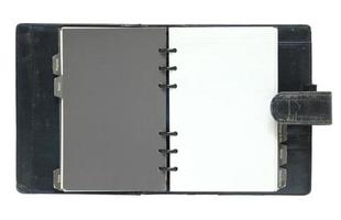 caderno velho aberto isolado no fundo branco com traçado de recorte foto
