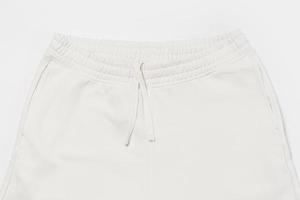textura de tecido de algodão de uma calça de moletom branca foto