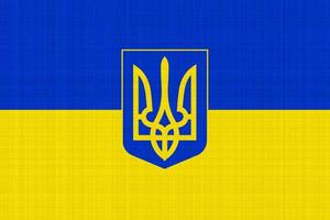 bandeira e brasão de armas da ucrânia em um plano de fundo texturizado. colagem conceitual. foto