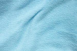 fundo abstrato de textura de toalha de tecido de algodão azul foto
