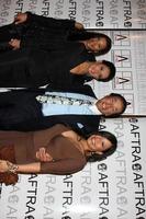 smokey robinson, esposa frances glandney e filhas tamla e berry chegando ao aftra media and entertainment Excellence awards amees no hotel biltmore em los angeles, ca em 9 de março de 2009 foto