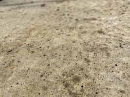 textura da superfície do concreto forte cinza sólido de construção natural, cimento áspero com pequenos seixos. o fundo foto