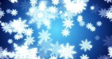 lindos flocos de neve festivos de natal azul ano novo brilhando caindo brilhando com efeito de desfoque e bokeh sobre fundo azul. fundo abstrato. protetor de tela foto