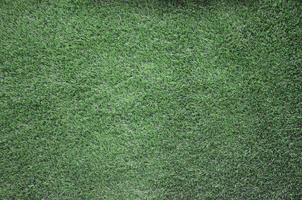 fundo de grama verde, plano de fundo texturizado padrão de gramado verde foto