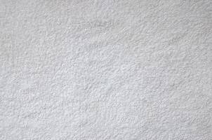 textura de fundo de toalha de algodão natural branco sem dobras foto
