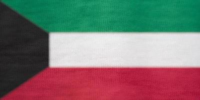 textura da bandeira do Kuwait como plano de fundo foto