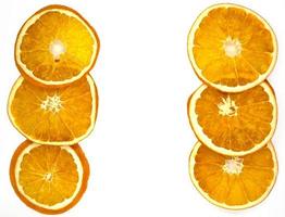 fatias de laranja secas, plano de fundo. foto