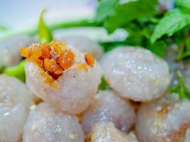 sobremesa tailandesa comida de rua chamada saku sai moo foto