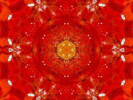 caleidoscópio de fogo vermelho colorido flor abstrata de fundo e padrão simétrico foto