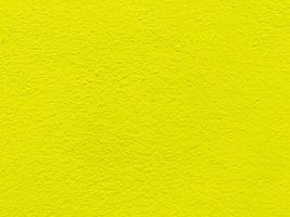 textura perfeita da parede de cimento amarelo uma superfície áspera, com espaço para texto, para um fundo. foto