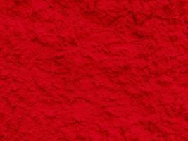 textura perfeita da parede de cimento vermelho uma superfície áspera, com espaço para texto, para um fundo. foto