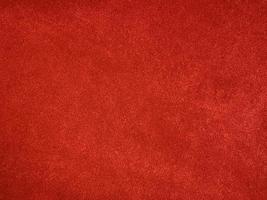textura de tecido de veludo vermelho escuro usado como plano de fundo. fundo de tecido vermelho vazio de material têxtil macio e liso. há espaço para text.chinese new year,valentine foto