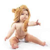 bebê em gorro de urso foto