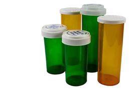 frascos de medicamentos farmacêuticos verdes e amarelos foto