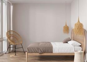 parede bege vazia no quarto moderno. mock up interior em estilo boho. livre, copie o espaço para sua foto, texto ou outro design. cama, poltrona de vime. renderização 3D. foto