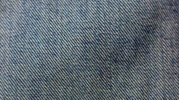 textura de jeans azul como pano de fundo foto