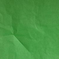 textura de papel de fundo verde amassado. fundo de alta qualidade e copie o espaço para o texto. foto