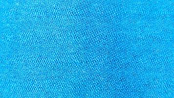 textura de pano azul como plano de fundo foto