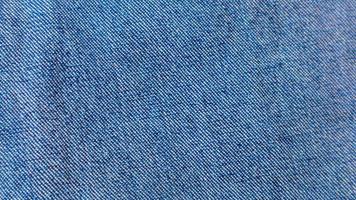 textura de jeans azul como pano de fundo foto