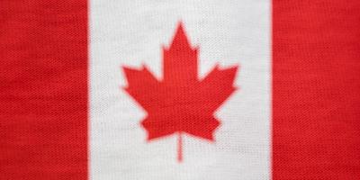 textura da bandeira canadense como plano de fundo foto