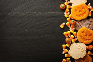 biscoitos e doces de abóbora de halloween foto