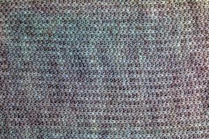 textura de tecido de lã tricotada para papel de parede e fundo abstrato. foto
