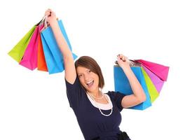 mulher com sacolas coloridas foto