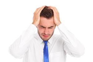 empresário estressado com dor de cabeça foto