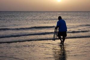 pesca de praia, pesca tradicional como hobby foto