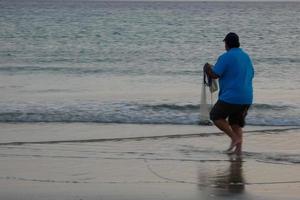 pesca de praia, pesca tradicional como hobby foto