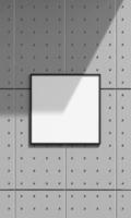 maquete de quadro de pôster pendurado na parede cinza. renderização 3d foto