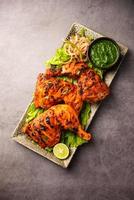 frango tandoori é um alimento picante indiano não vegetariano foto