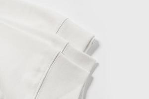 closeup de tecido de moletom de algodão textura de roupas brancas foto