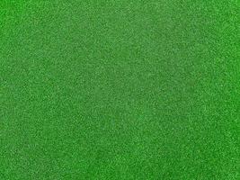 grama verde textura fundo grama jardim vista superior. conceito usado para fazer campo de futebol de fundo verde, golfe de grama, plano de fundo texturizado padrão de gramado verde. foto