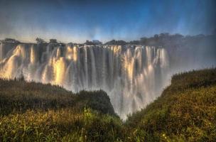 Victoria Falls na fronteira do Zimbábue e da Zâmbia foto