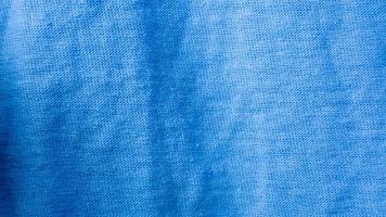 textura de pano azul como plano de fundo foto