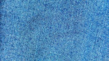 textura de jeans azul como plano de fundo foto