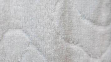 textura de toalha branca como plano de fundo foto
