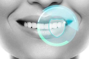 dentes protegidos por uma boa higiene, produtos e cuidados dentários foto
