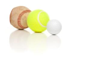 bola de beisebol, tênis e golfe em branco foto